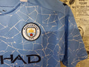 CAMISA MANCHESTER CITY - CASA/ HOME - TORCEDOR - 20/21
