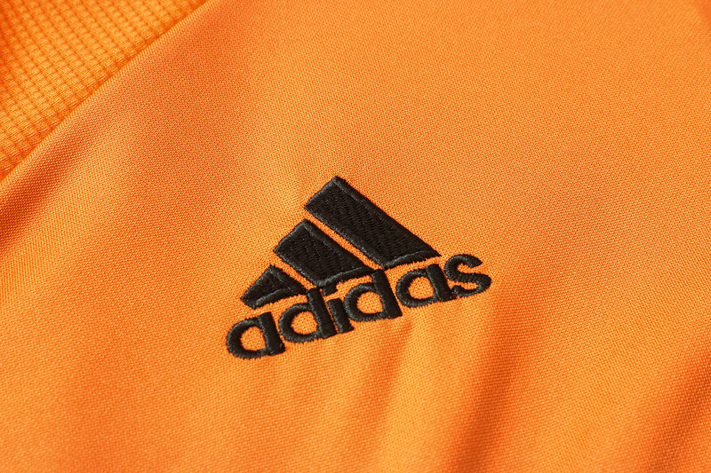 KIT PRÉ JOGO - MANCHESTER UNITED - LARANJA E PRETO