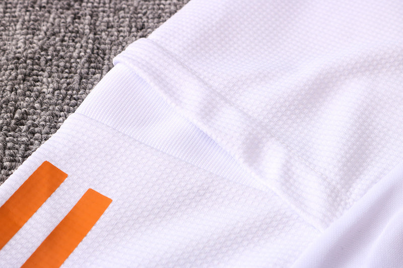 KIT PRÉ JOGO - MANCHESTER UNITED - BRANCO, PRETO E LARANJA