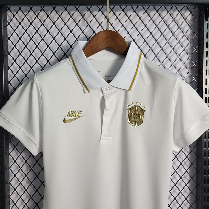 CAMISA  BRASIL - PÓLO -  BRANCA COM ESCUDO DOURADO - CBF - FEMININO - 22/ 23