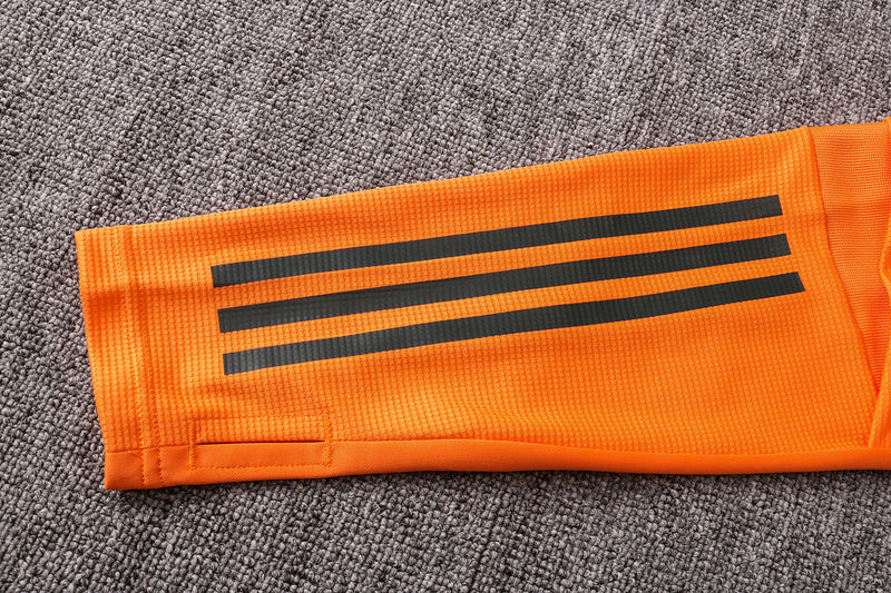 KIT PRÉ JOGO - MANCHESTER UNITED - LARANJA E PRETO