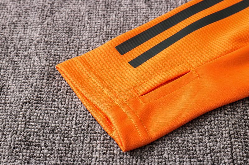 KIT PRÉ JOGO - MANCHESTER UNITED - LARANJA E PRETO